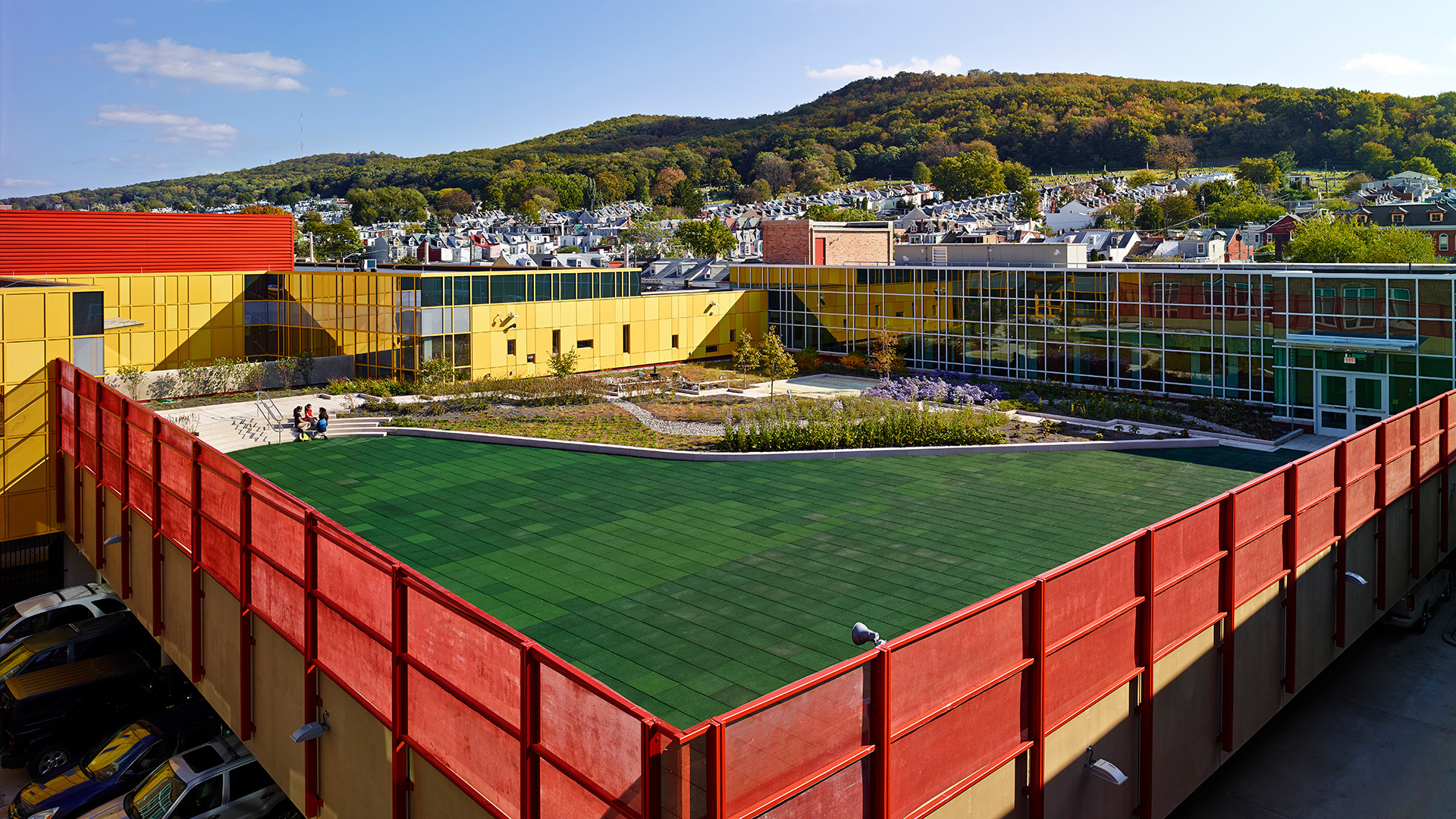 Renovated and expanded Amanda E. Stout Elementary School with elevated play area
