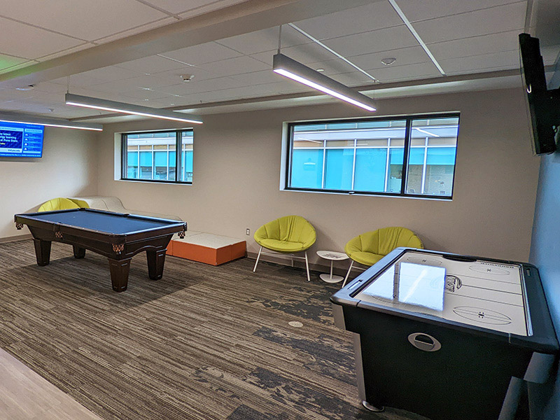 Student recreation lounge at the PAW Center at Penn State DuBois with pool table and seating area
