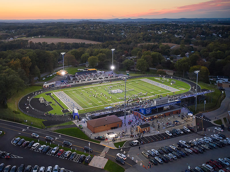 Aerial view of renovated Wildcat Stadium at Dallastown Area School District with LED field lighting and new grandstands