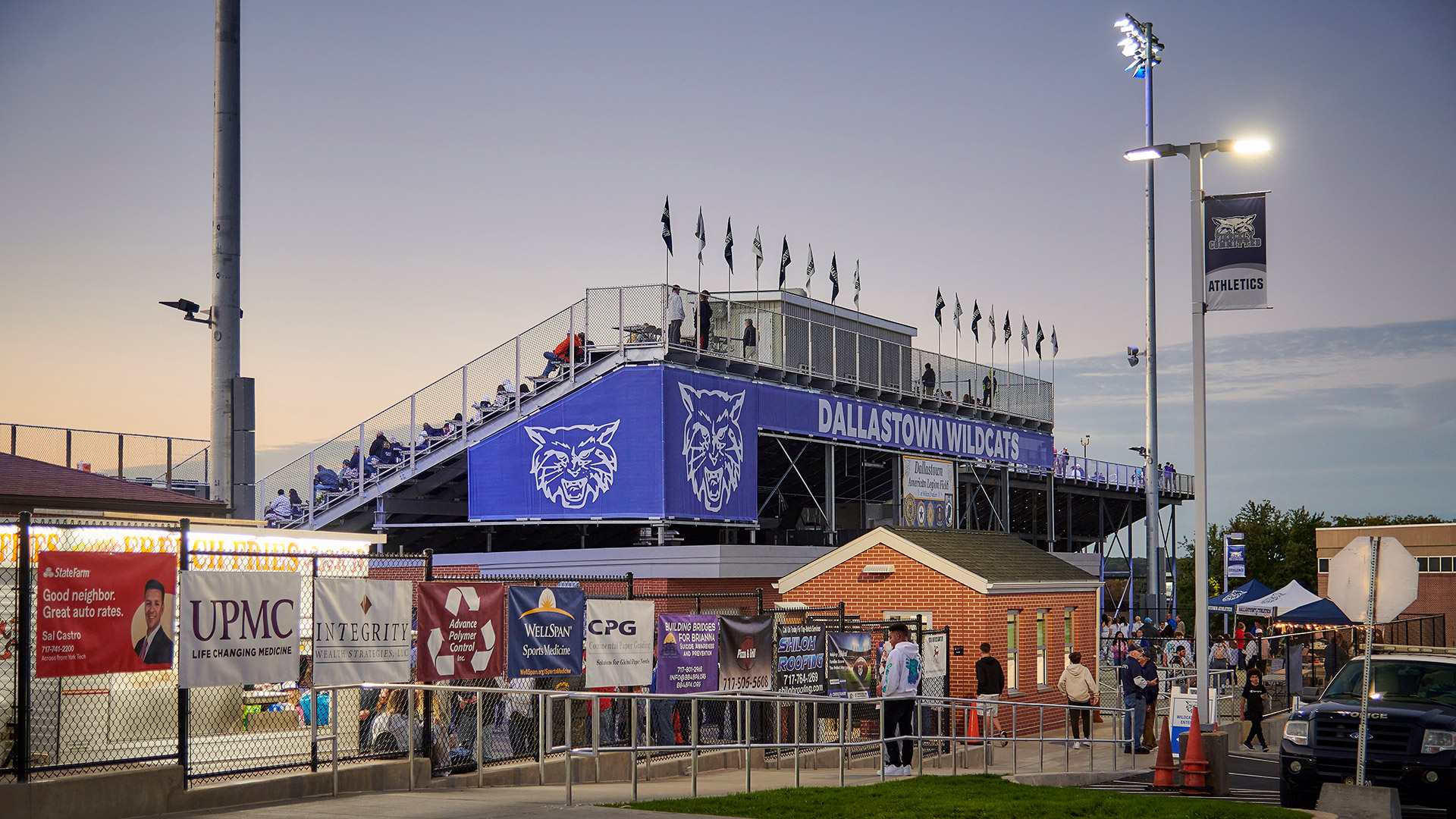 New field house and grandstands at Wildcat Stadium for Dallastown Area School District with press box and site upgrades