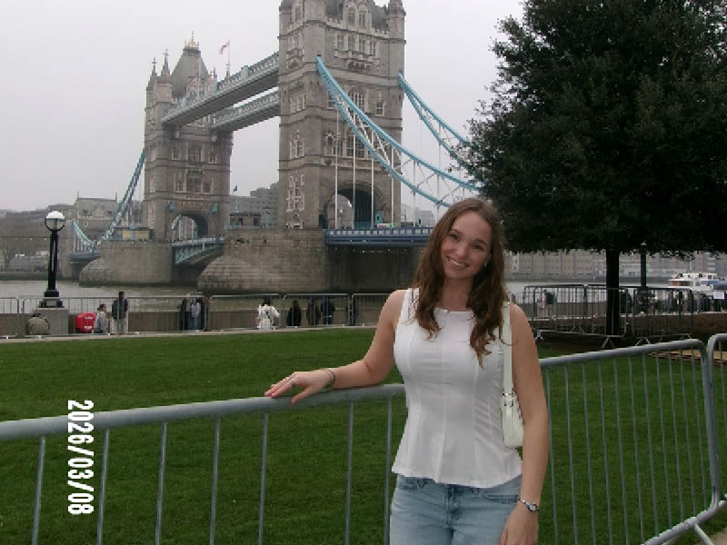 Vanessa posing in front of Tower Bridge in London, England.